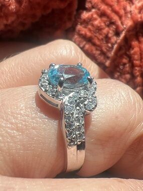 Sterling Silver Blue Topaz Halo Ring with Pavé Accents